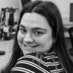 Profile photograph person looking at camera